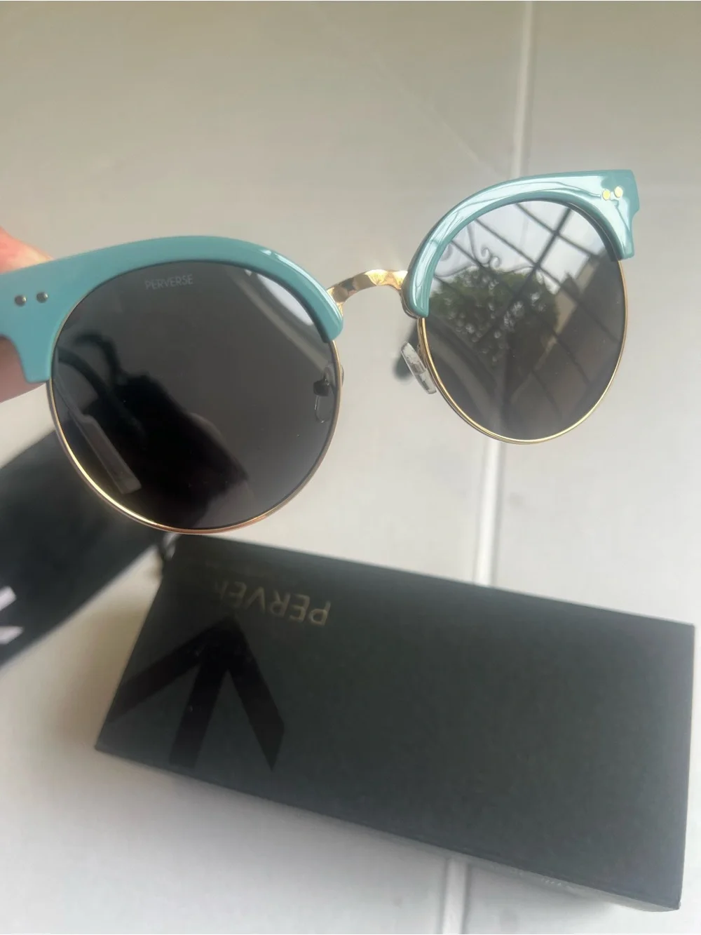 Perverse Teal Round Sunglasses with Black Lenses